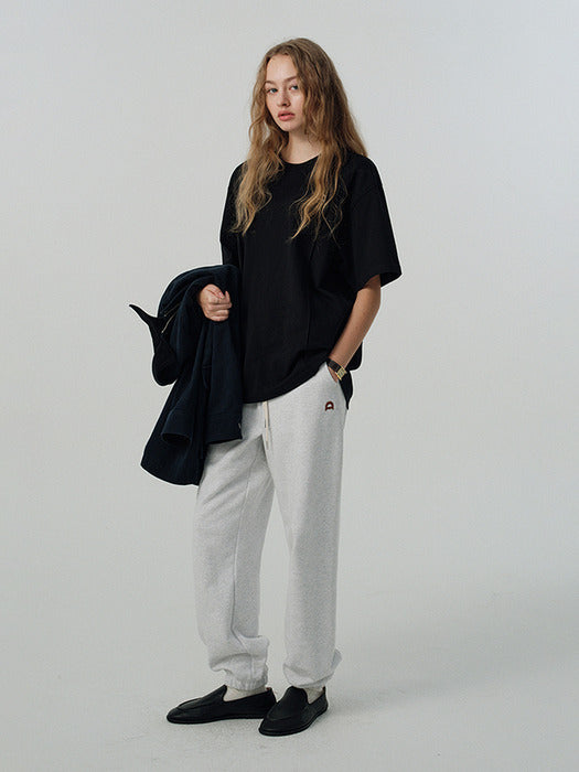 UNISEX LEATHER LOGO SWEAT PANTS LIGHT MELANGE GREY_UDPA5A101G1