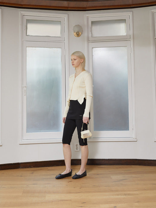 UNBALANCE CUT LINE BUTTON CARDIGAN IN BUTTER