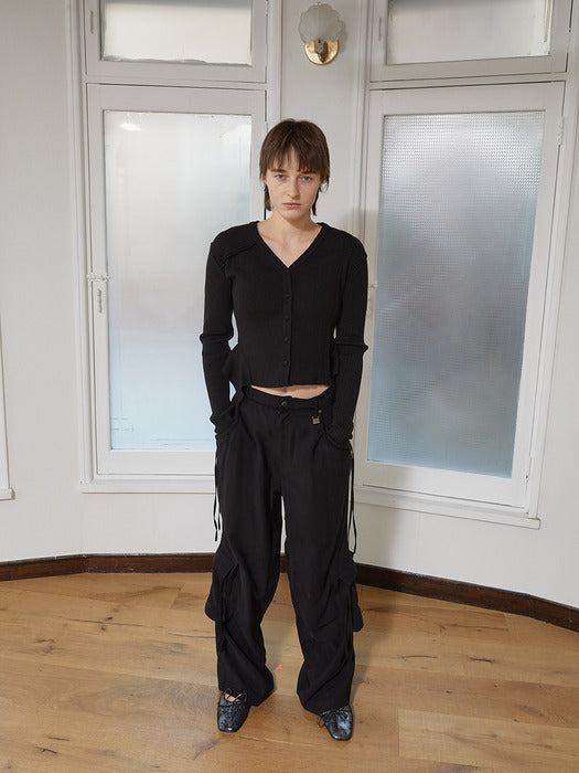 UNBALANCE CUT LINE BUTTON CARDIGAN IN BLACK