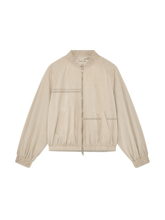 WASHED VOLUME BOMBER JUMPER IN BEIGE