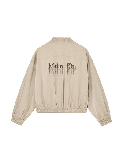 WASHED VOLUME BOMBER JUMPER IN BEIGE