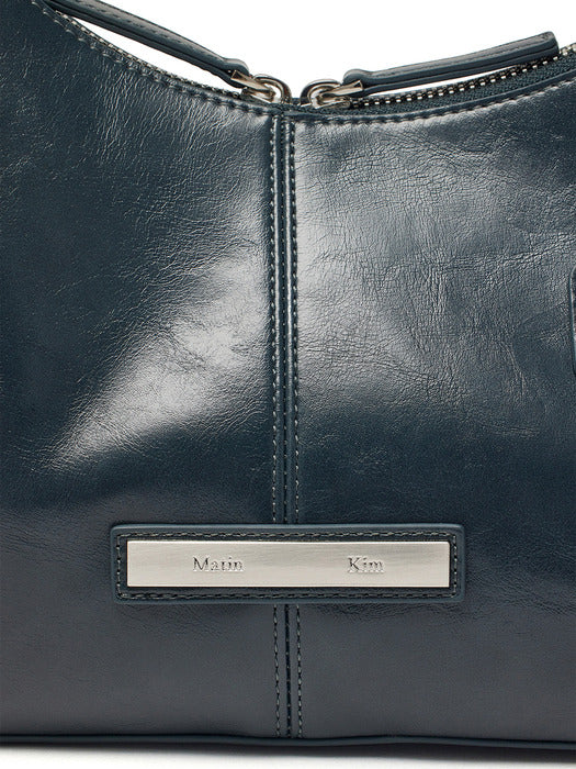 ASYMMETRICAL ZIPPER BAG IN CHARCOAL