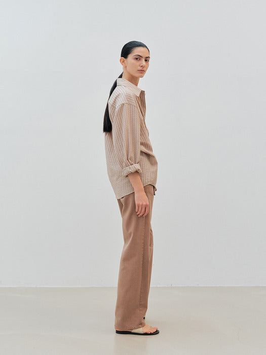 Clothing in beige - Premium quality product image