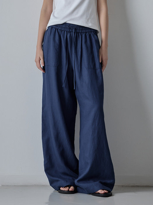 Facade Pattern Stitch Pocket Banding Pants blue