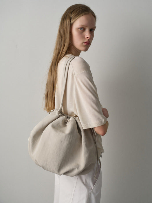 Facade Pattern Pull Bag beige
