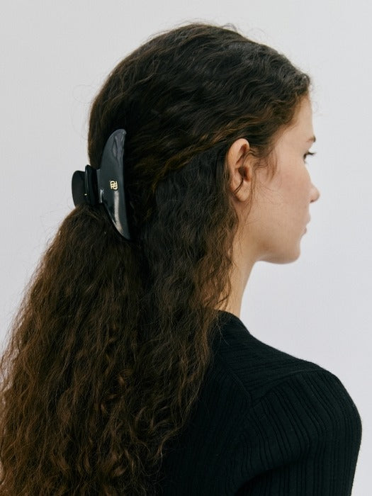 Depound cellulose hair claw - black