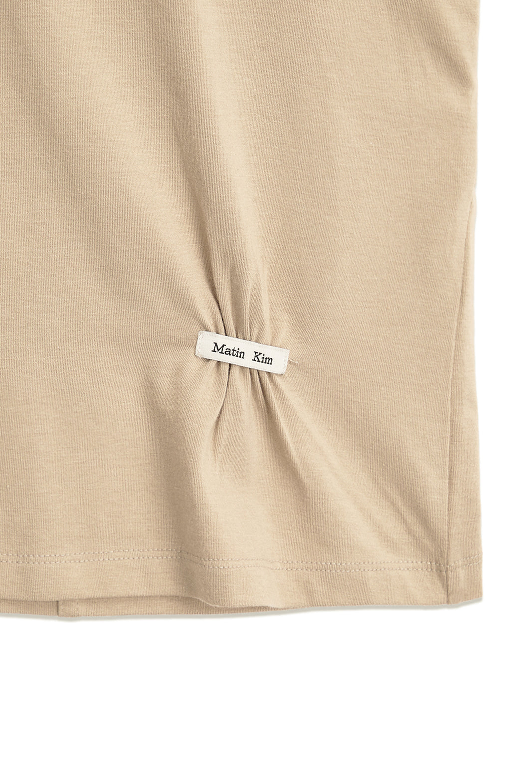 [matinkim] MINI LABEL SHIRRING TOP IN BEIGE