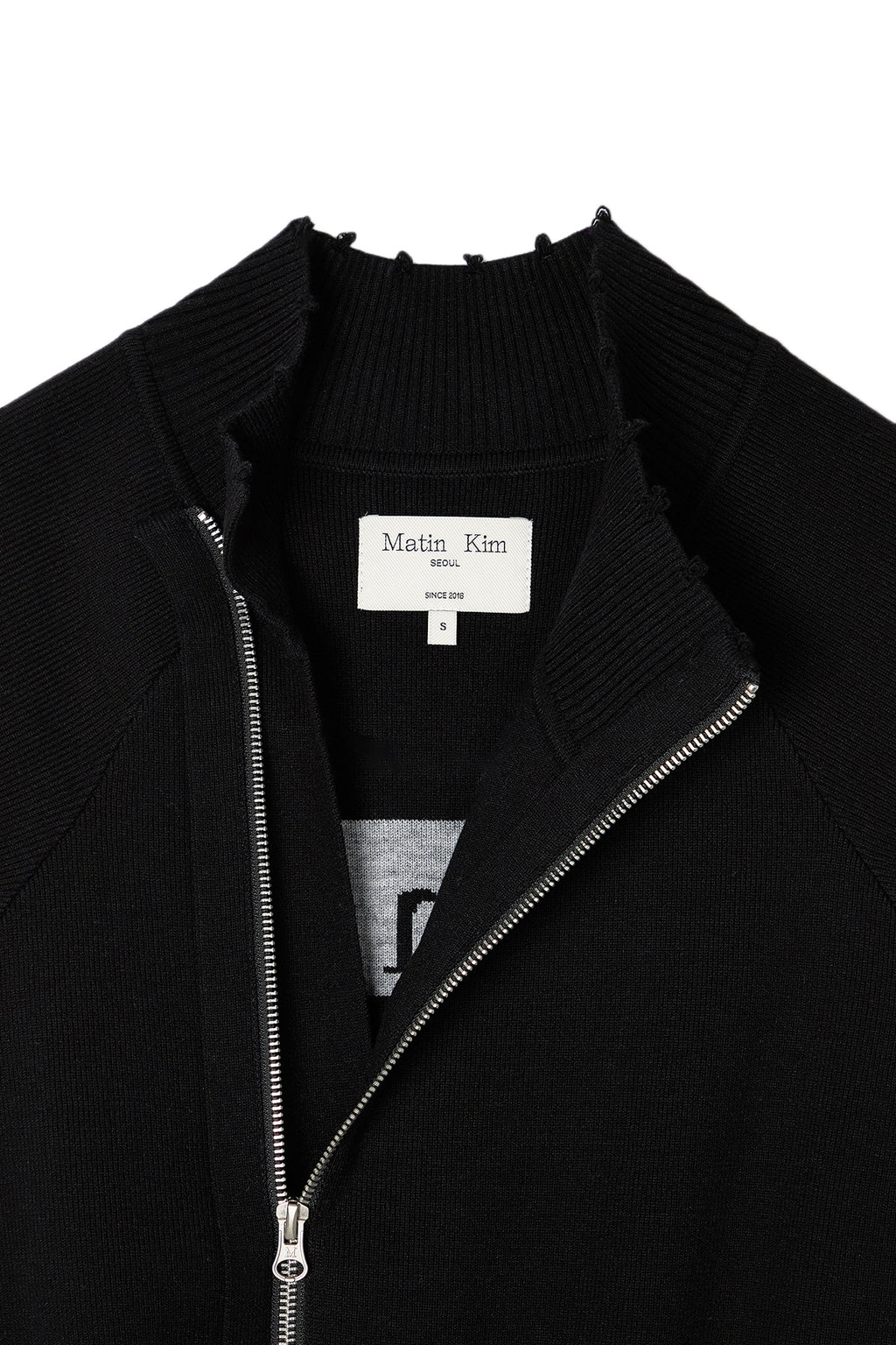 [matinkim] HIGH NECK LOGO KNIT ZIP UP VEST IN BLACK