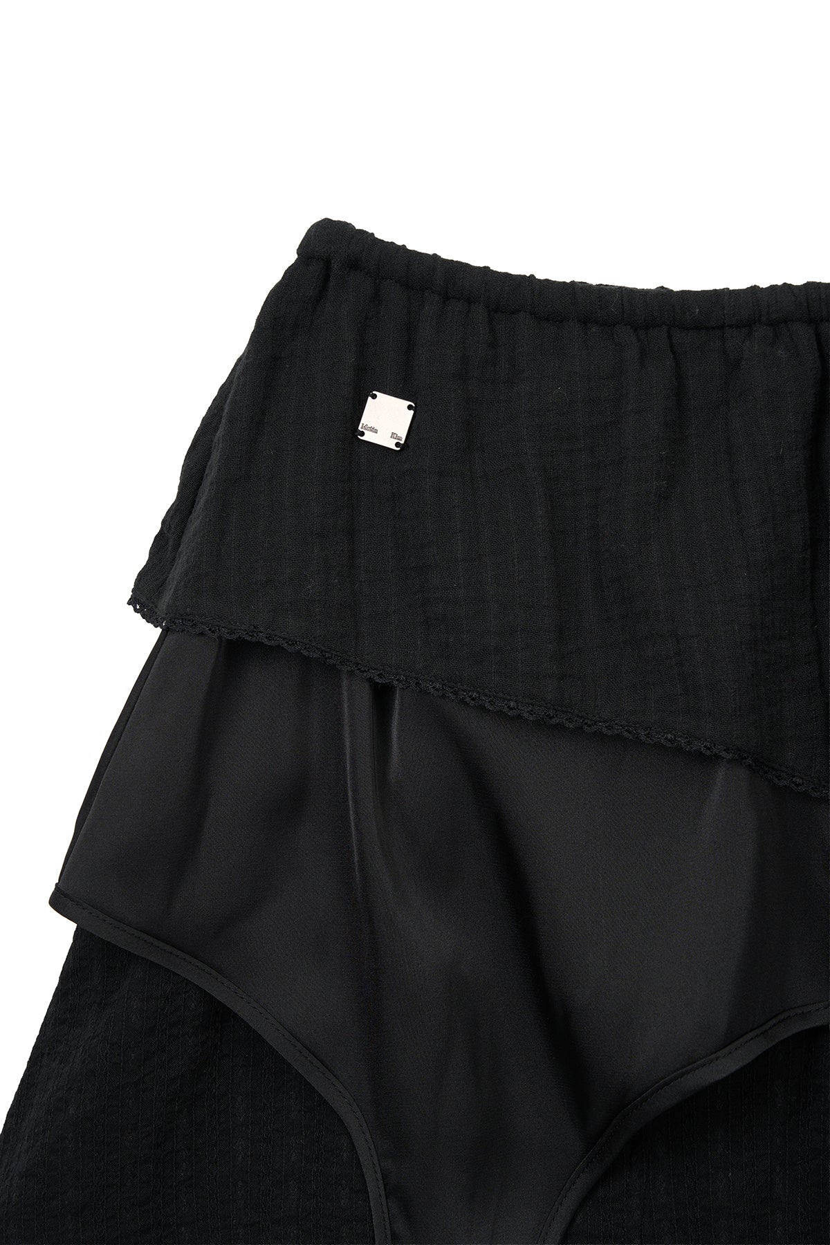 [matinkim] MULTI PANEL LAYERED SKIRT IN BLACK