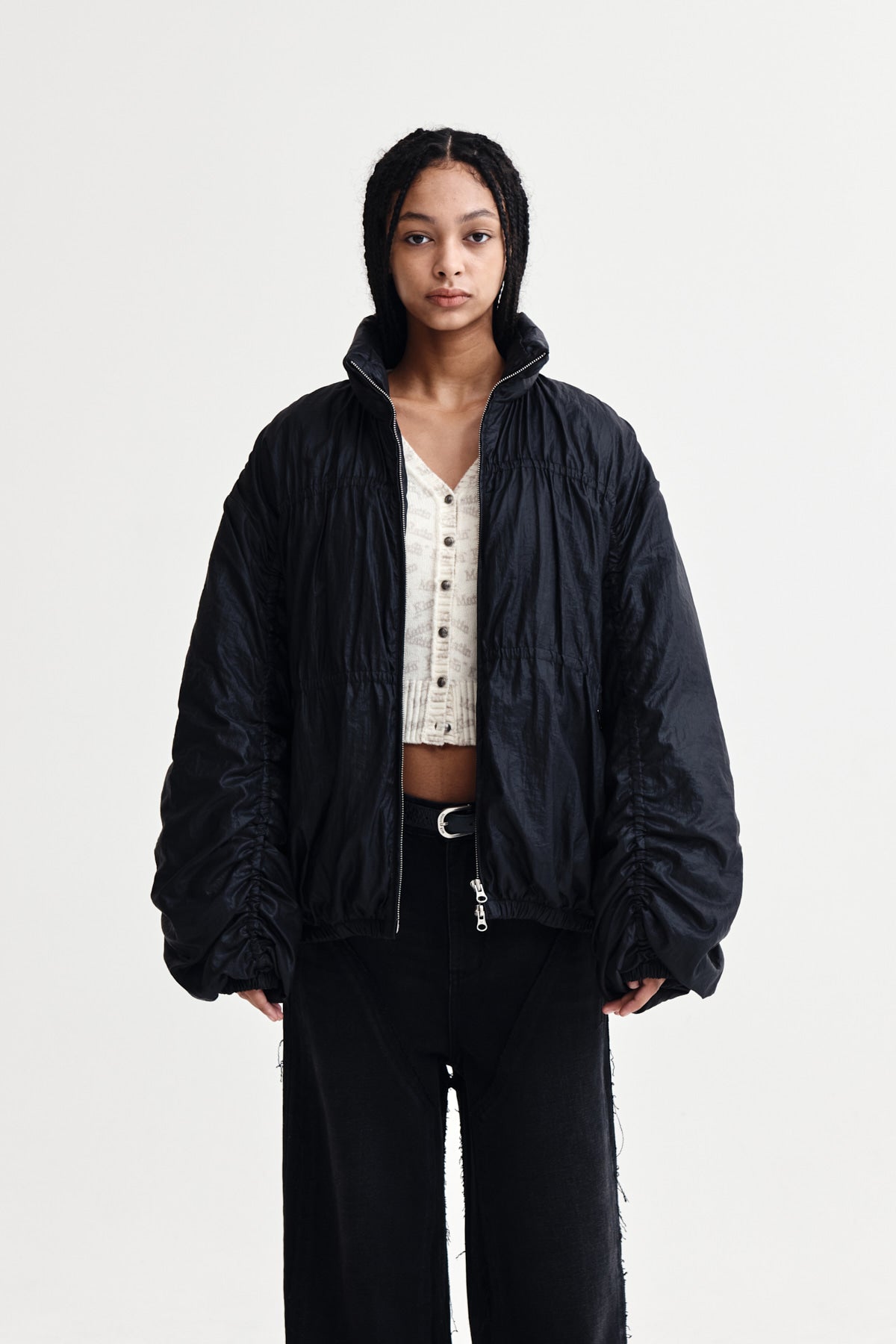 [matinkim] HIGH NECK SHIRRING DOWN JUMPER IN BLACK