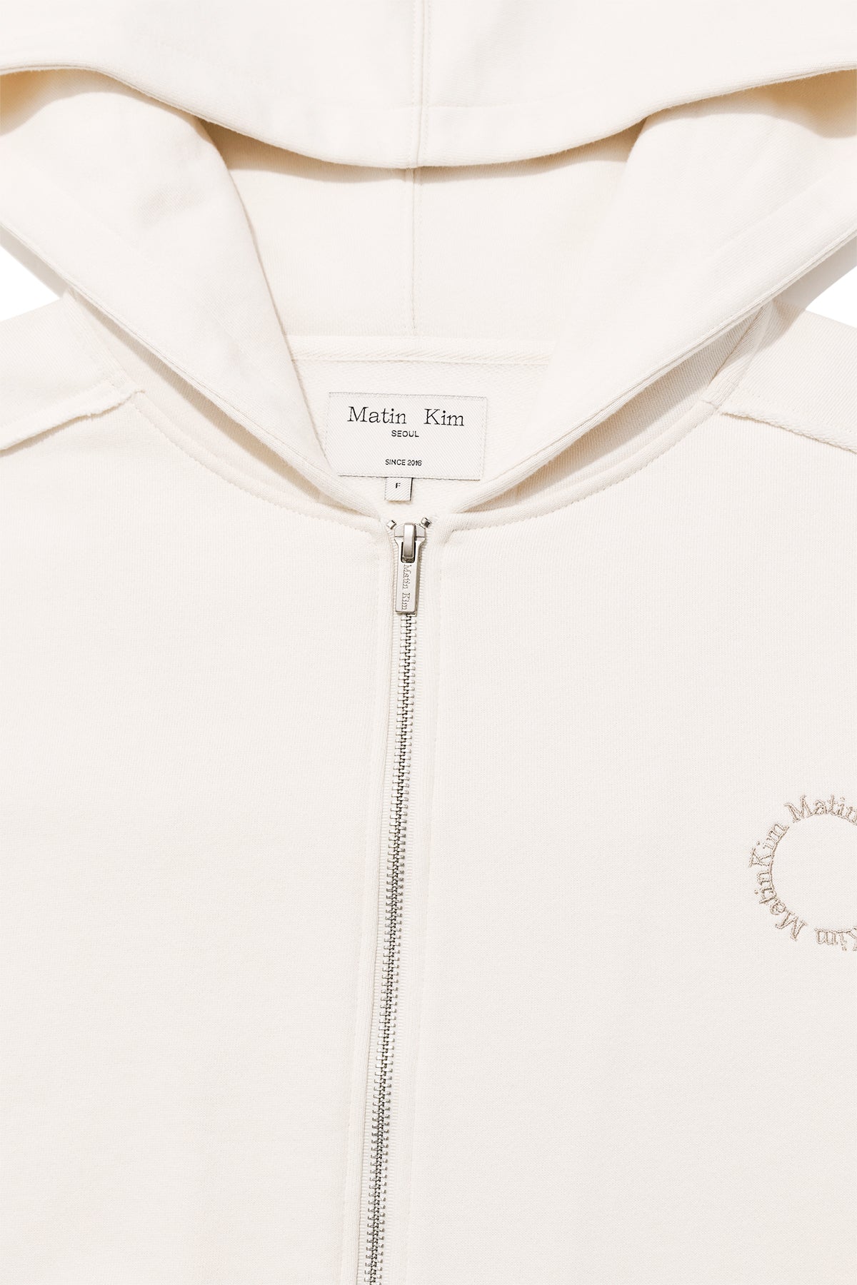 [matinkim] VOLUME POCKET HOODY ZIP UP IN CREAM