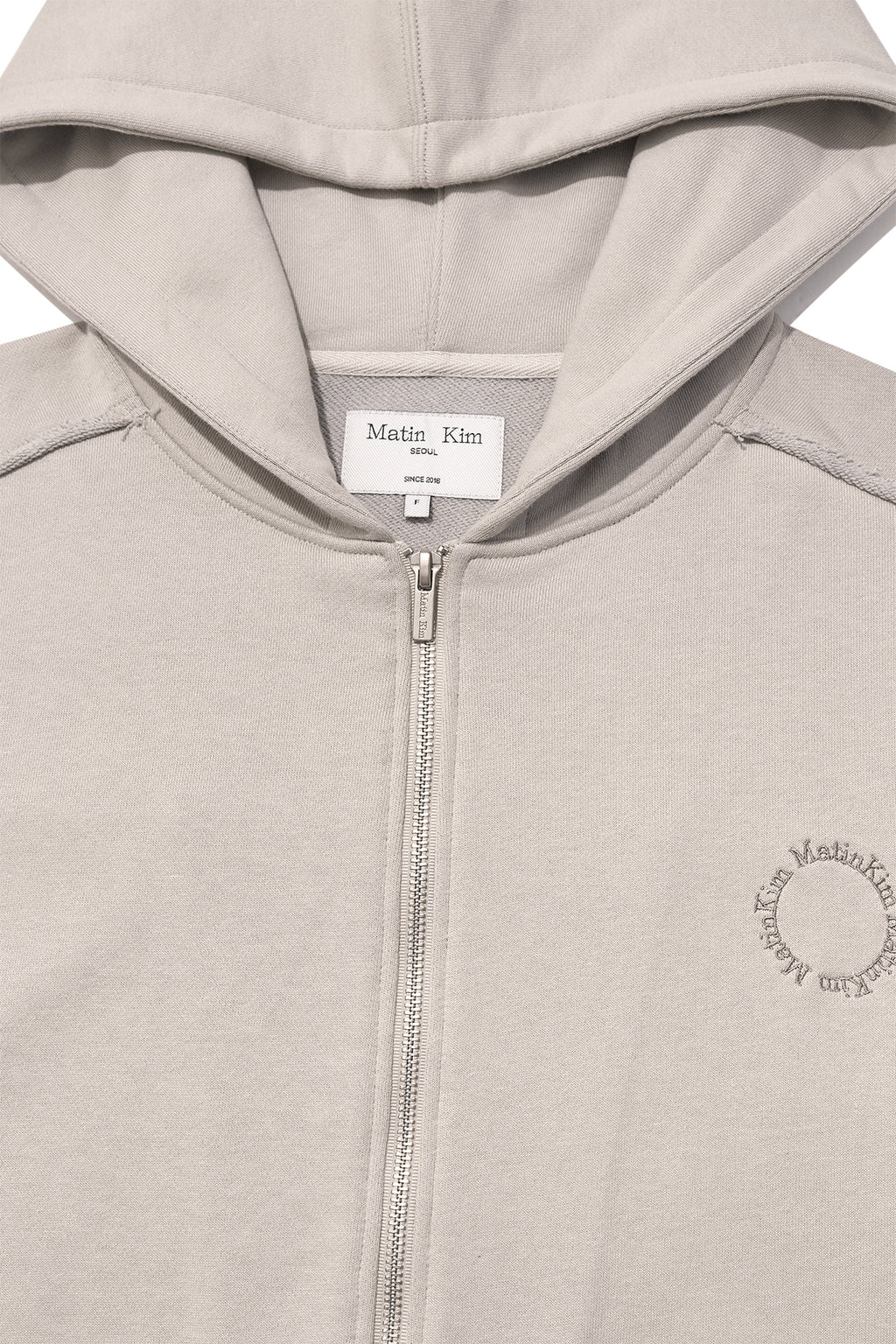 [matinkim] VOLUME POCKET HOODY ZIP UP IN BEIGE