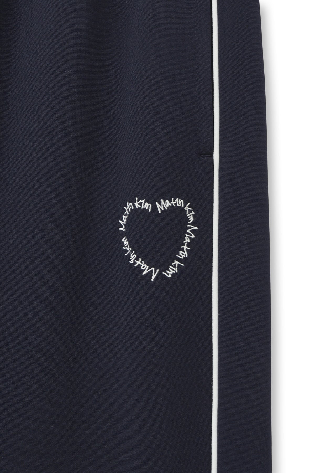 [matinkim] HEART LOGO TRACK PANTS IN NAVY