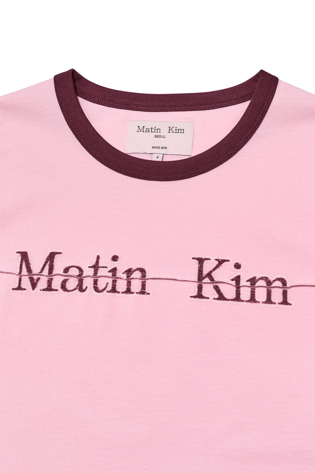 [matinkim] LOGO CUTTED RINGER CROP TOP IN LIGHT PINK