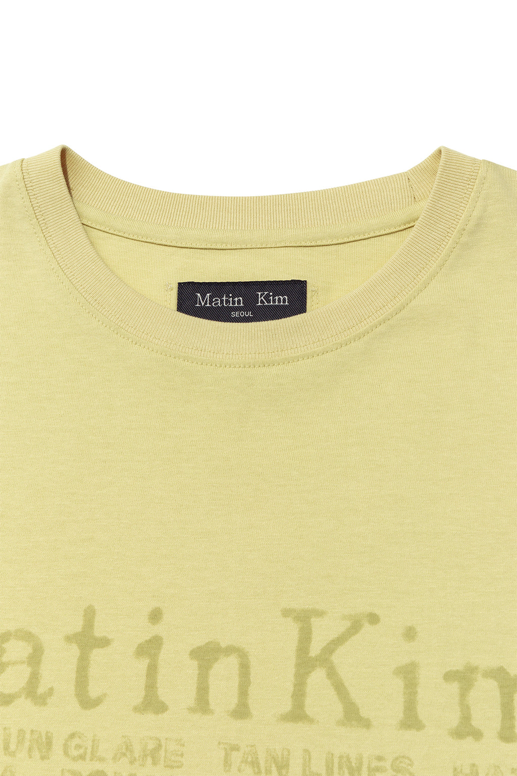 [matinkim] SWEAT PRINTING LOGO TOP FOR MEN IN LIGHT YELLOW