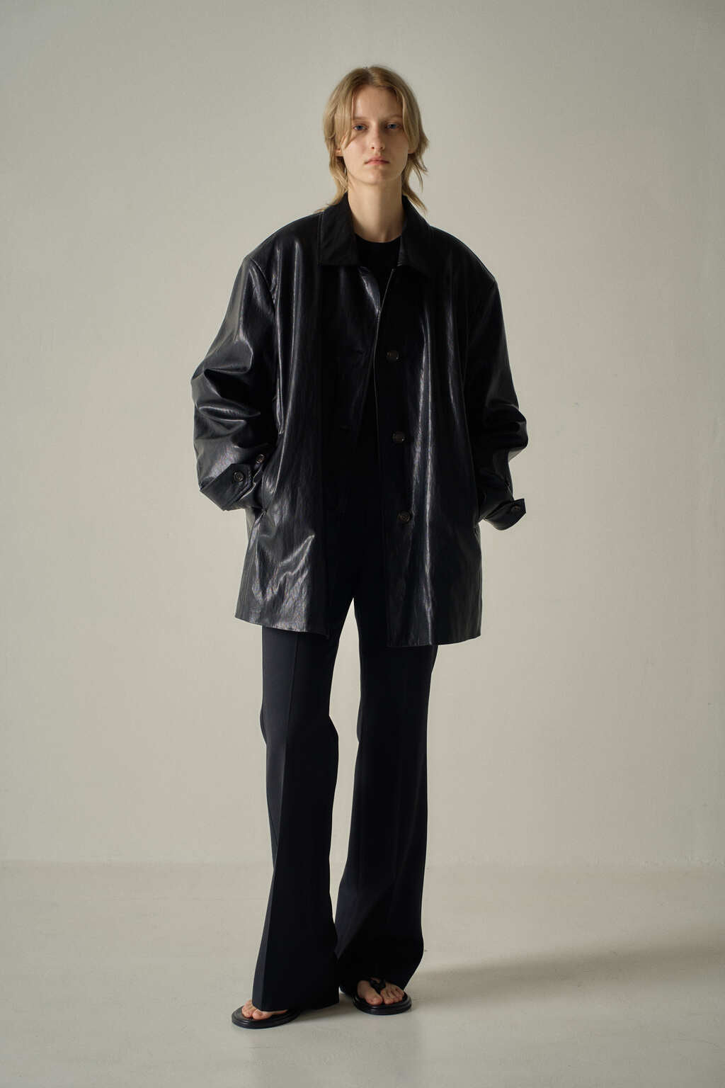 Facade Pattern Leather Half Coat black