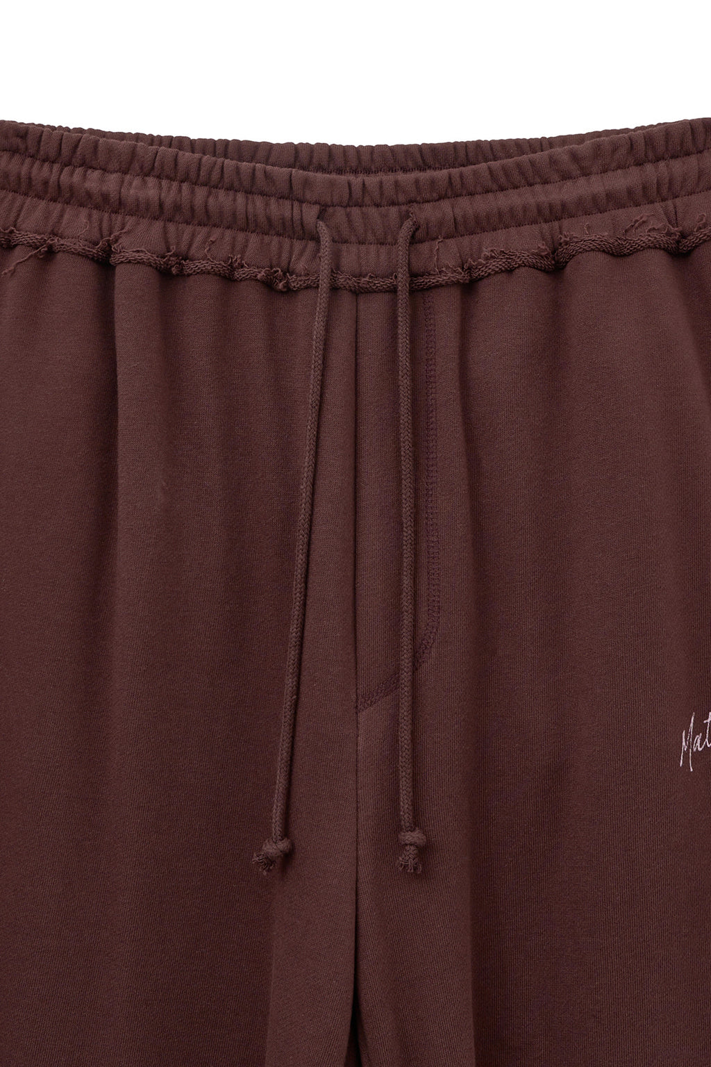 [matinkim] DRAWSTRING POINT SWEATPANTS IN BURGUNDY