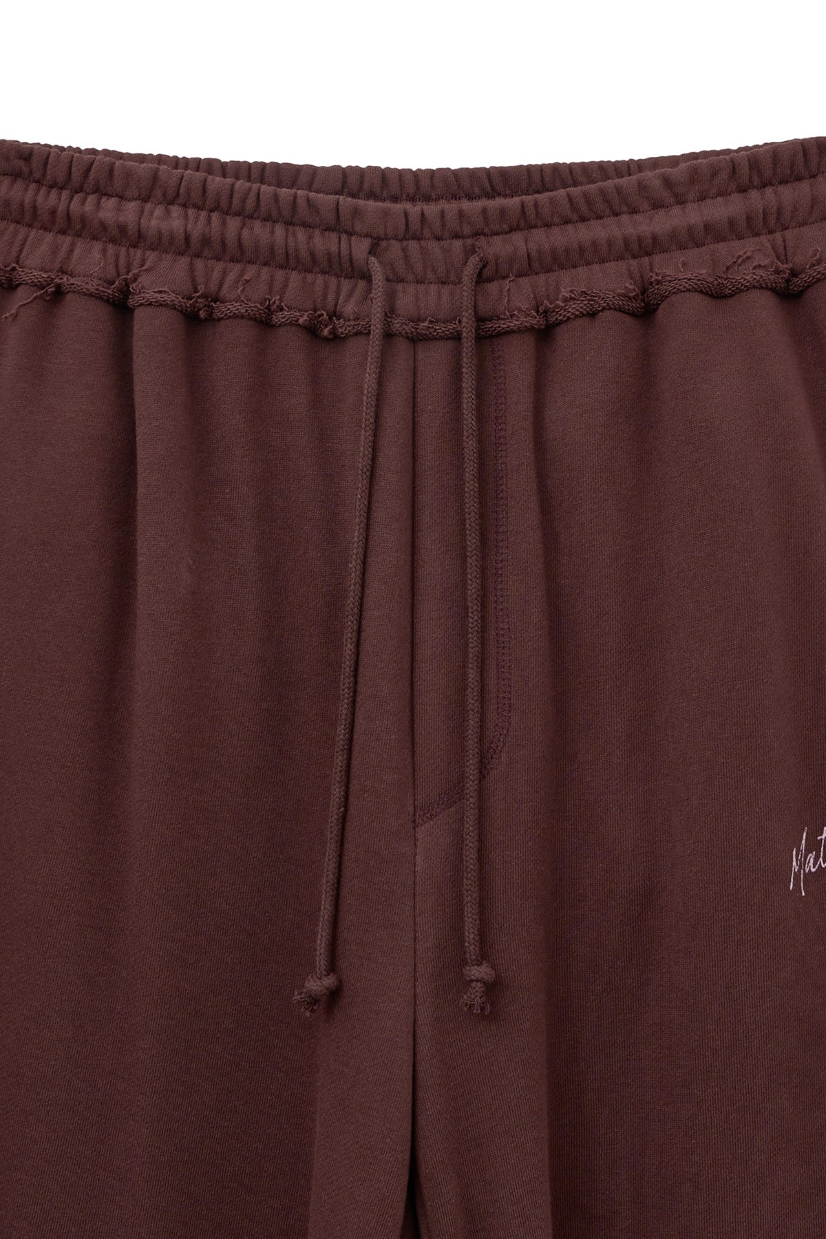 [matinkim] DRAWSTRING POINT SWEATPANTS IN BURGUNDY