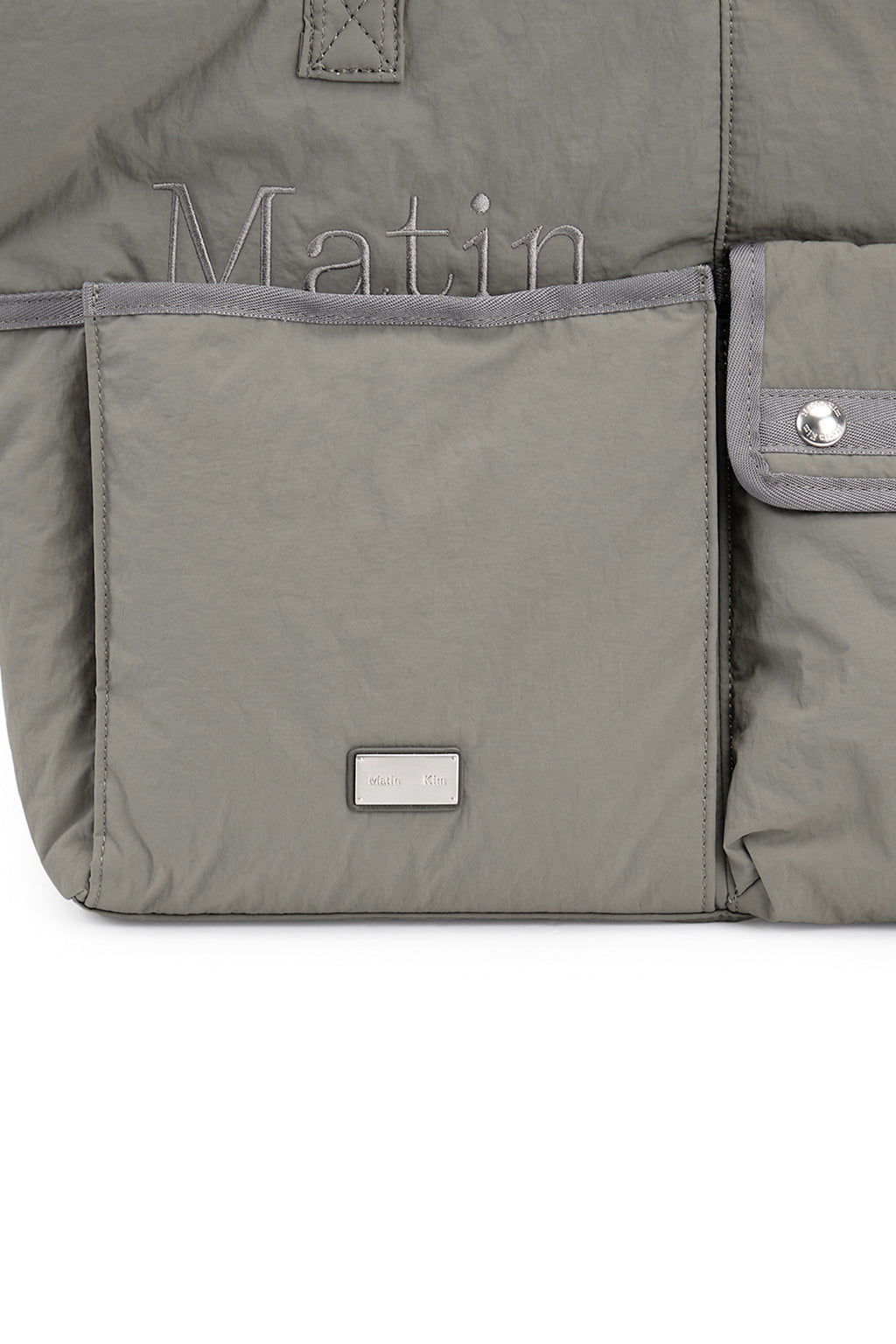 [matinkim] POCKET UTILITY NYLON BIG SHOULDER BAG IN KHAKI