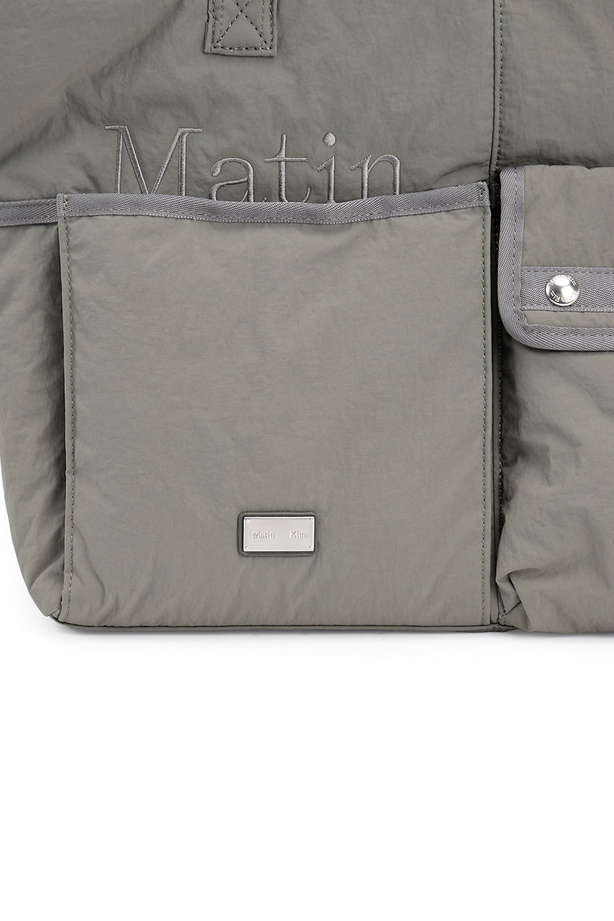 [matinkim] POCKET UTILITY NYLON BIG SHOULDER BAG IN KHAKI
