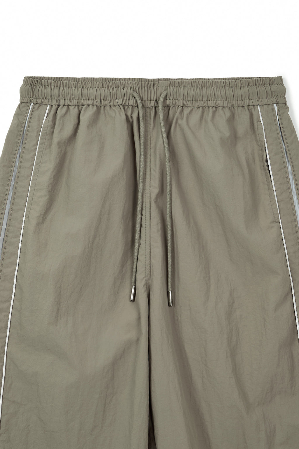 [matinkim] SIDE LOGO WIDE TRACK PANTS IN KHAKI