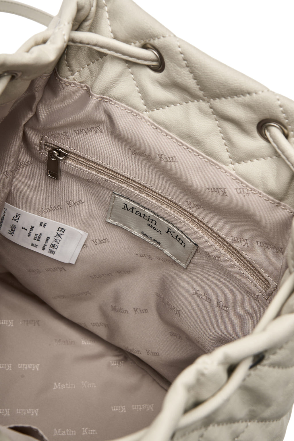 Matinkim Double Pocket Quilting Backpack IN Light Beige
