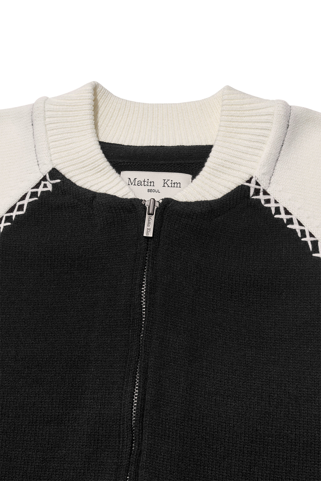 [matinkim] BACK LOGO RAGLAN KNIT ZIP UP IN BLACK