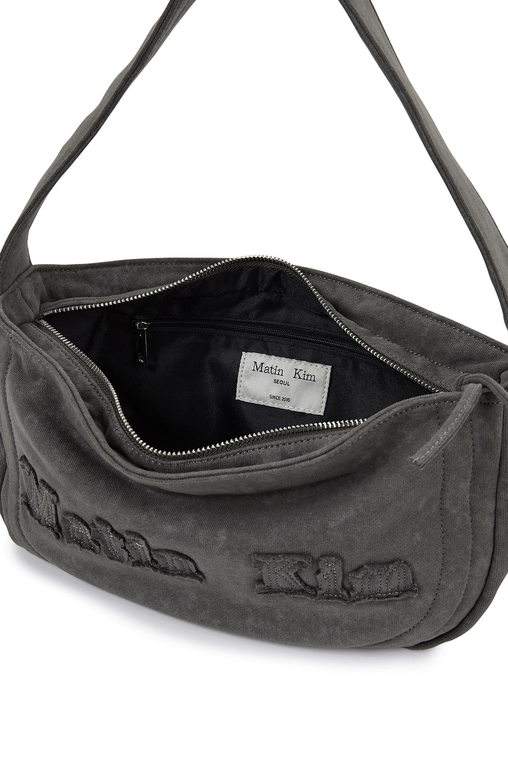 [matinkim] APPLIQUE LOGO JERSEY SHOULDER BAG IN CHARCOAL