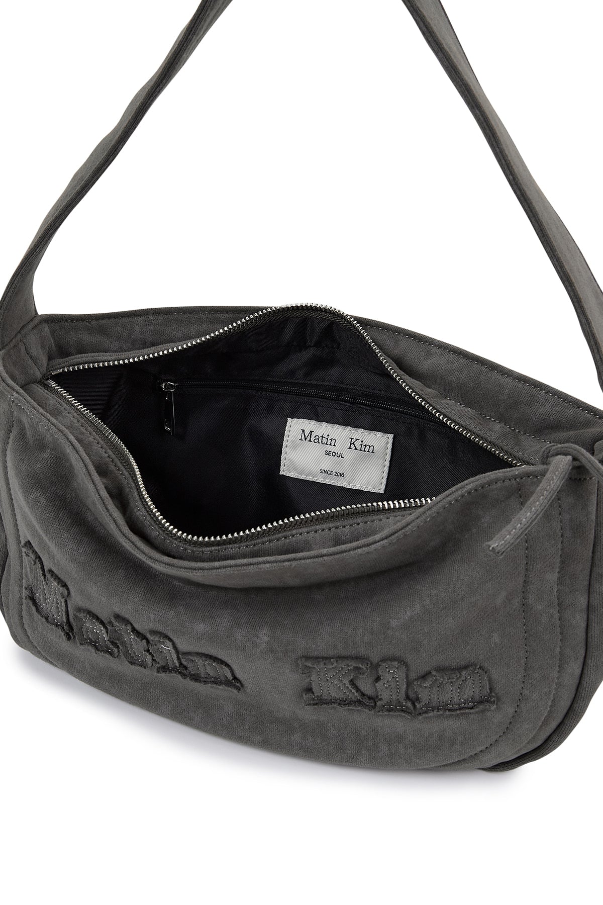 [matinkim] APPLIQUE LOGO JERSEY SHOULDER BAG IN CHARCOAL