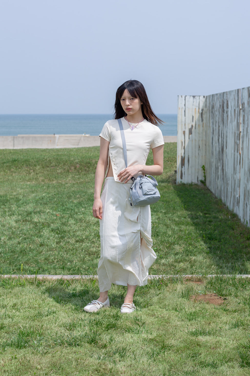 [matinkim] SLIT BUTTON POINT CROP TOP IN IVORY