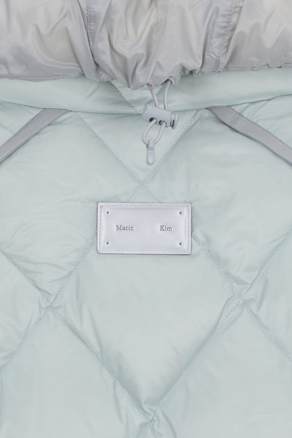 [matinkim] QUILTING HOODY LIGHTWEIGHT JUMPER (DOWN BLENDED) IN MINT
