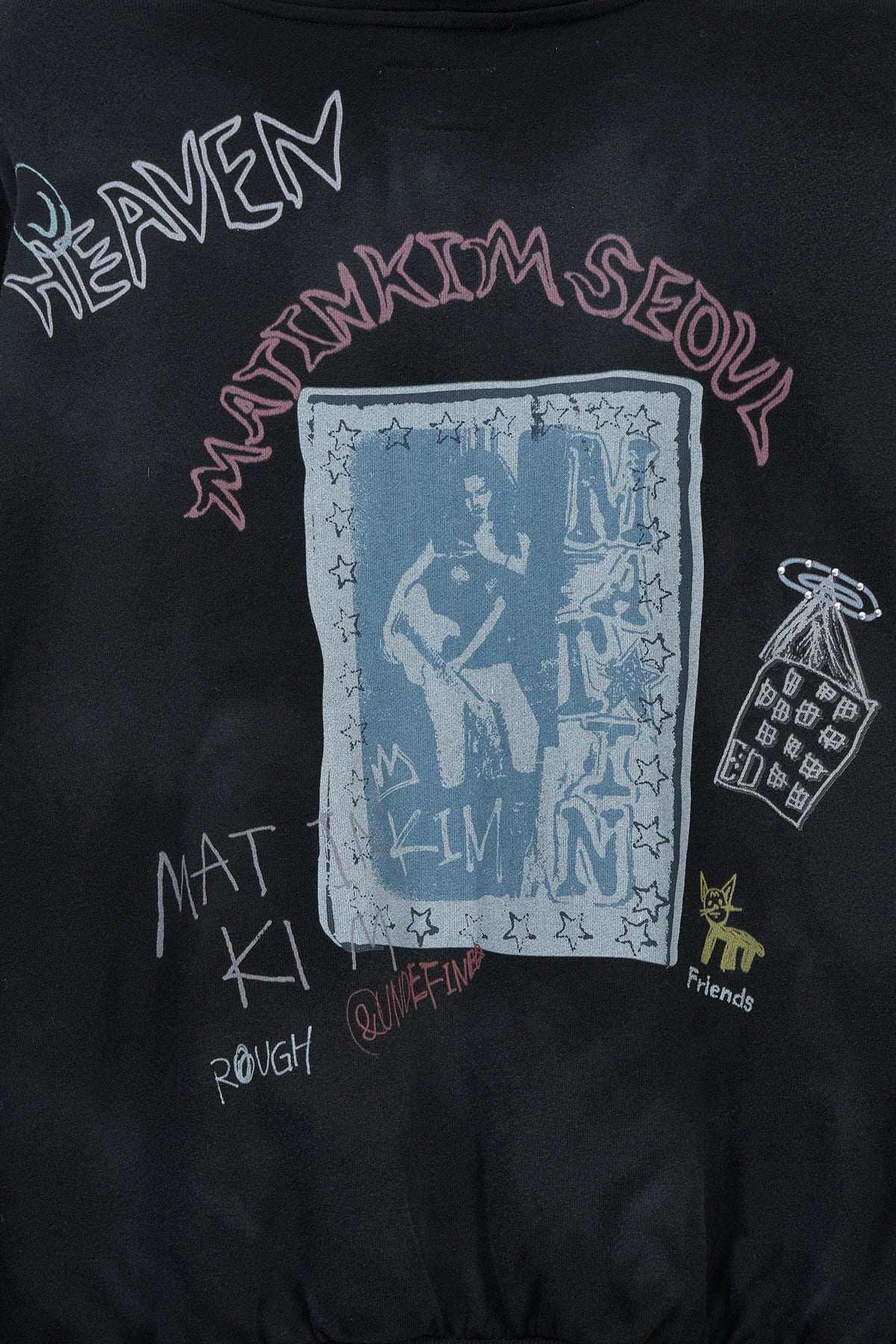 Matin Kim Vintage Washed Graffiti Hoodie Zip Up in Black, Korean designer outerwear.