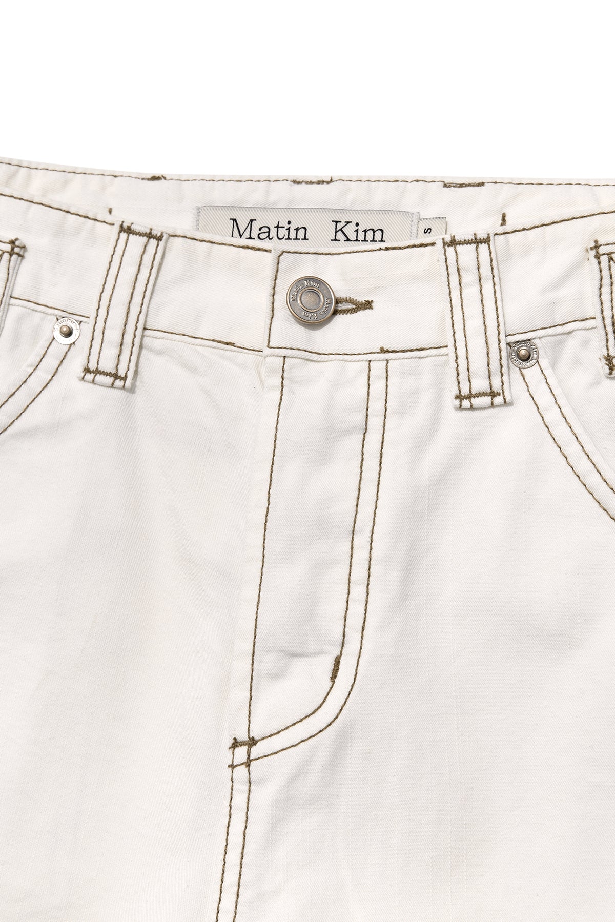 [matinkim] WAIST BUCKLE CURVED TWILL DENIM PANTS IN WHITE
