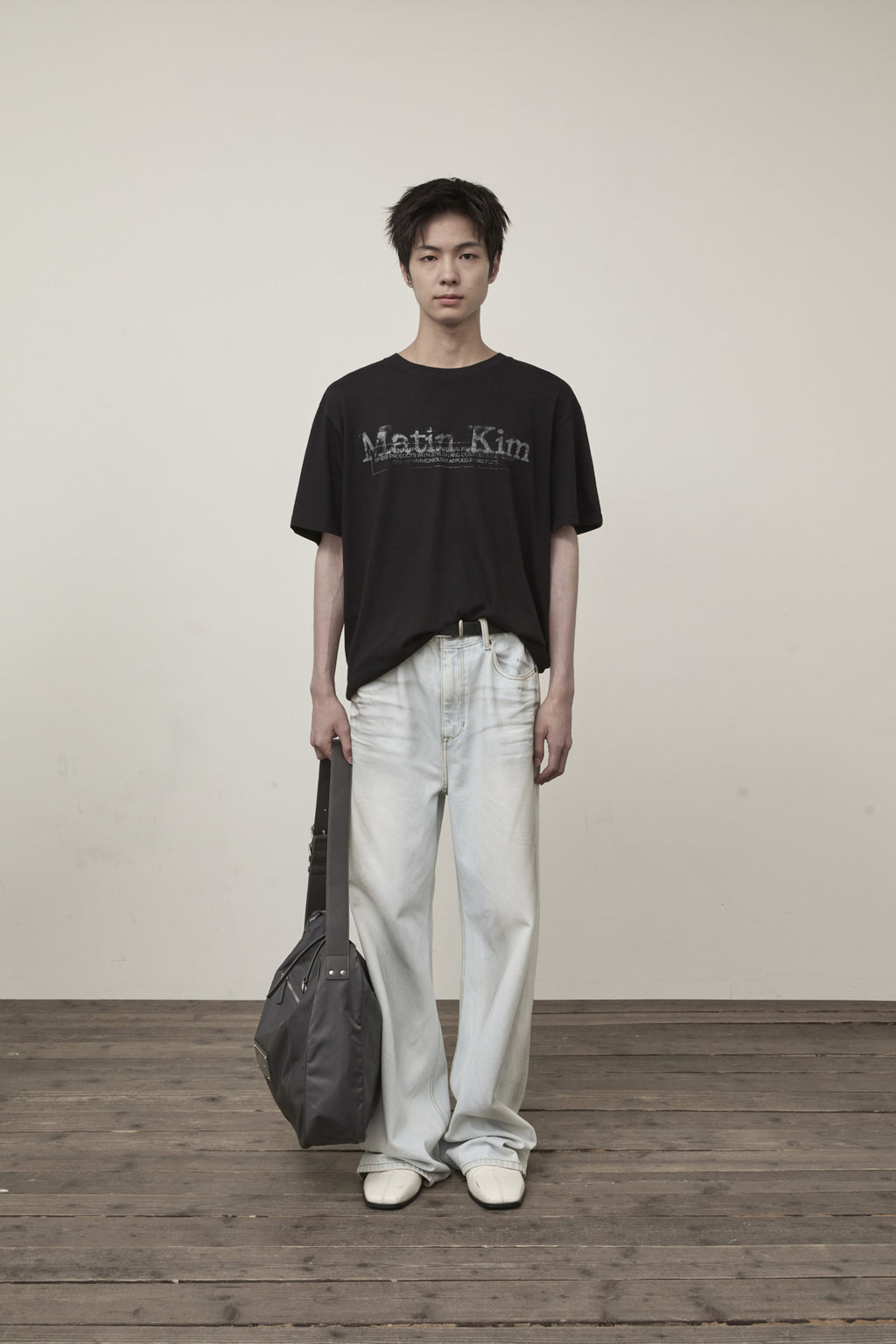[matinkim] STAMP LOGO GRAPHIC OVERSIZE TOP FOR MEN IN BLACK