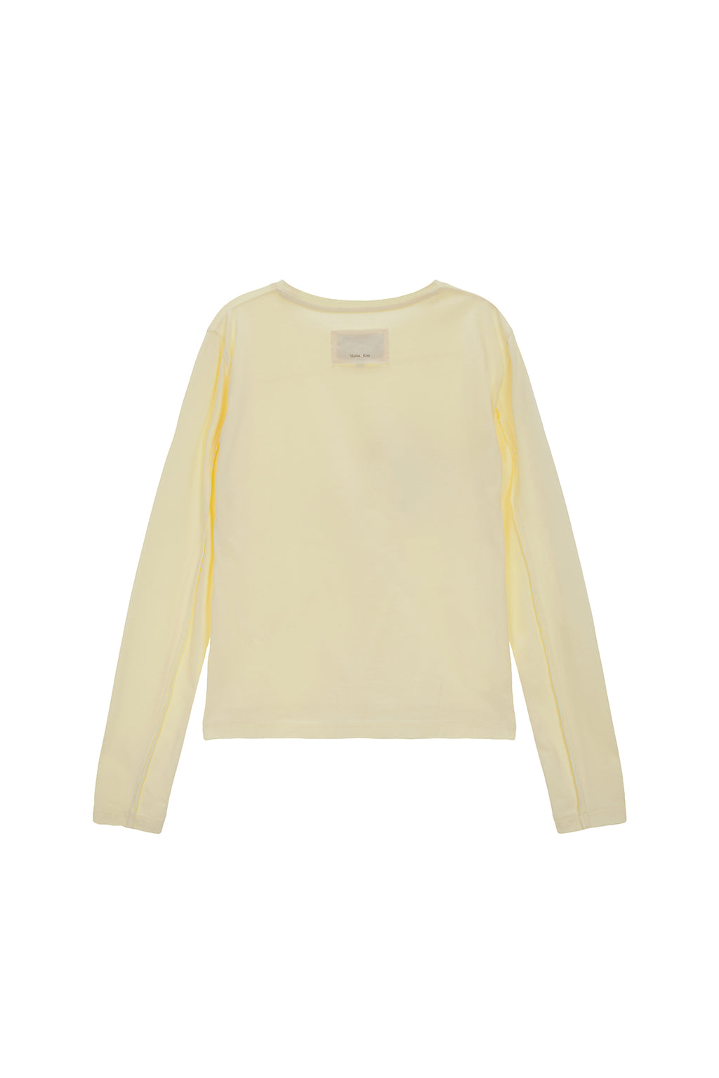[matinkim] DIAGONAL SLIMFIT LONG SLEEVE TOP IN LIGHT YELLOW
