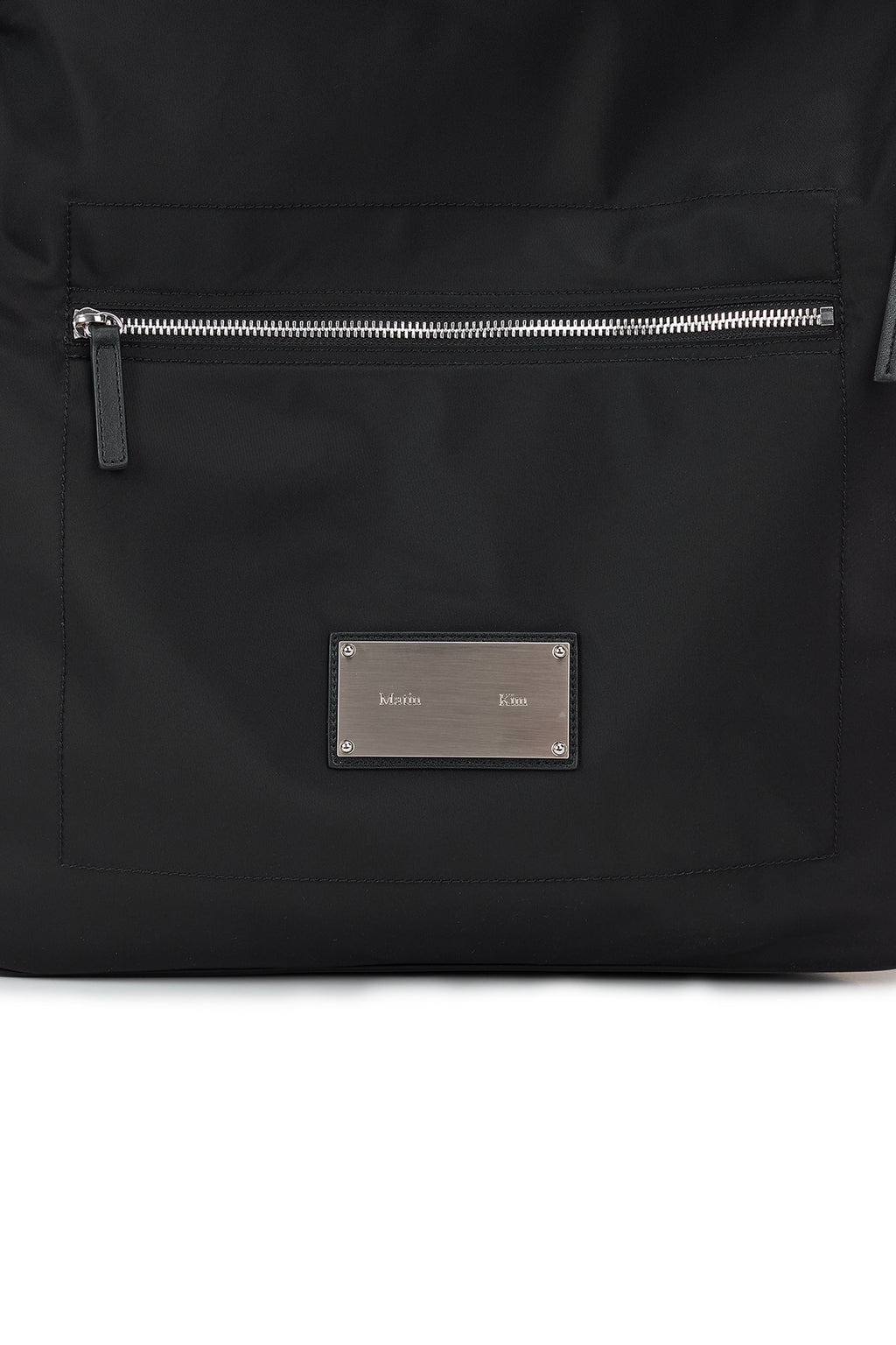 [matinkim] EMBOSSED LOGO FABRIC SHOULDER BAG IN BLACK
