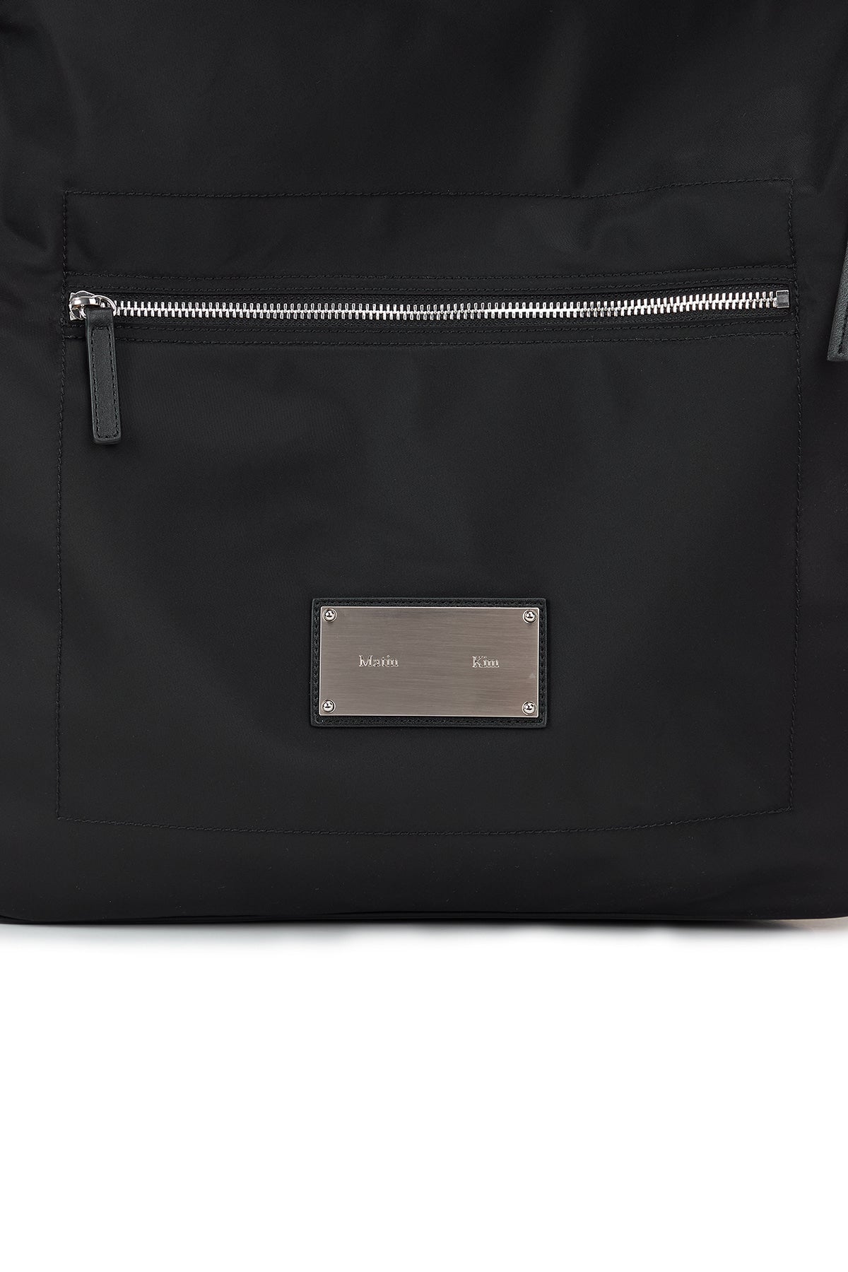 [matinkim] EMBOSSED LOGO FABRIC SHOULDER BAG IN BLACK