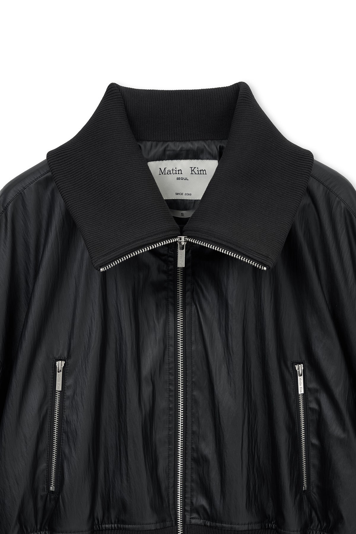 [matinkim] SHINE CRINKLE ZIP BLOUSON IN BLACK