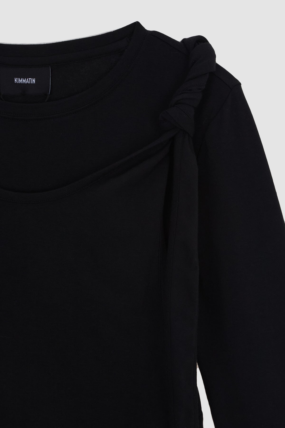 Matinkim Twist Strap Long Sleeve Top IN Black