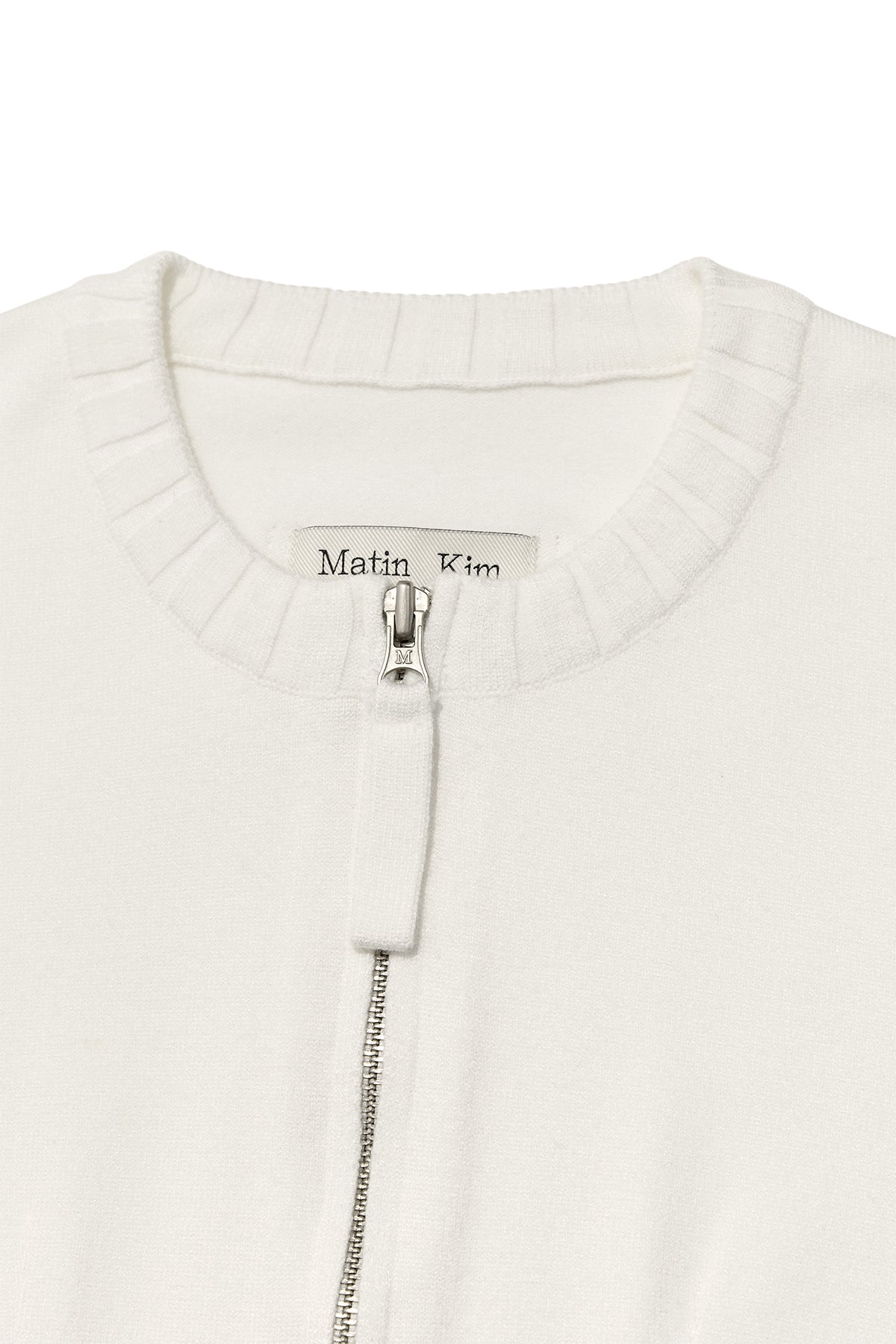 [matinkim] ROUND NECK ZIP UP CROP CARDIGAN IN IVORY