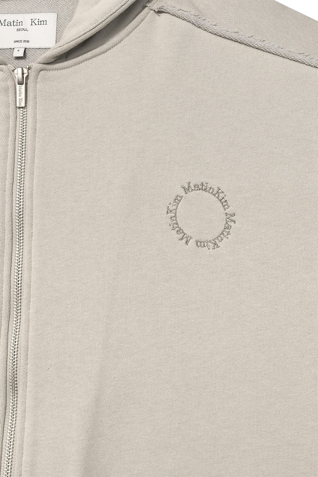 [matinkim] VOLUME POCKET HOODY ZIP UP IN PALE BEIGE