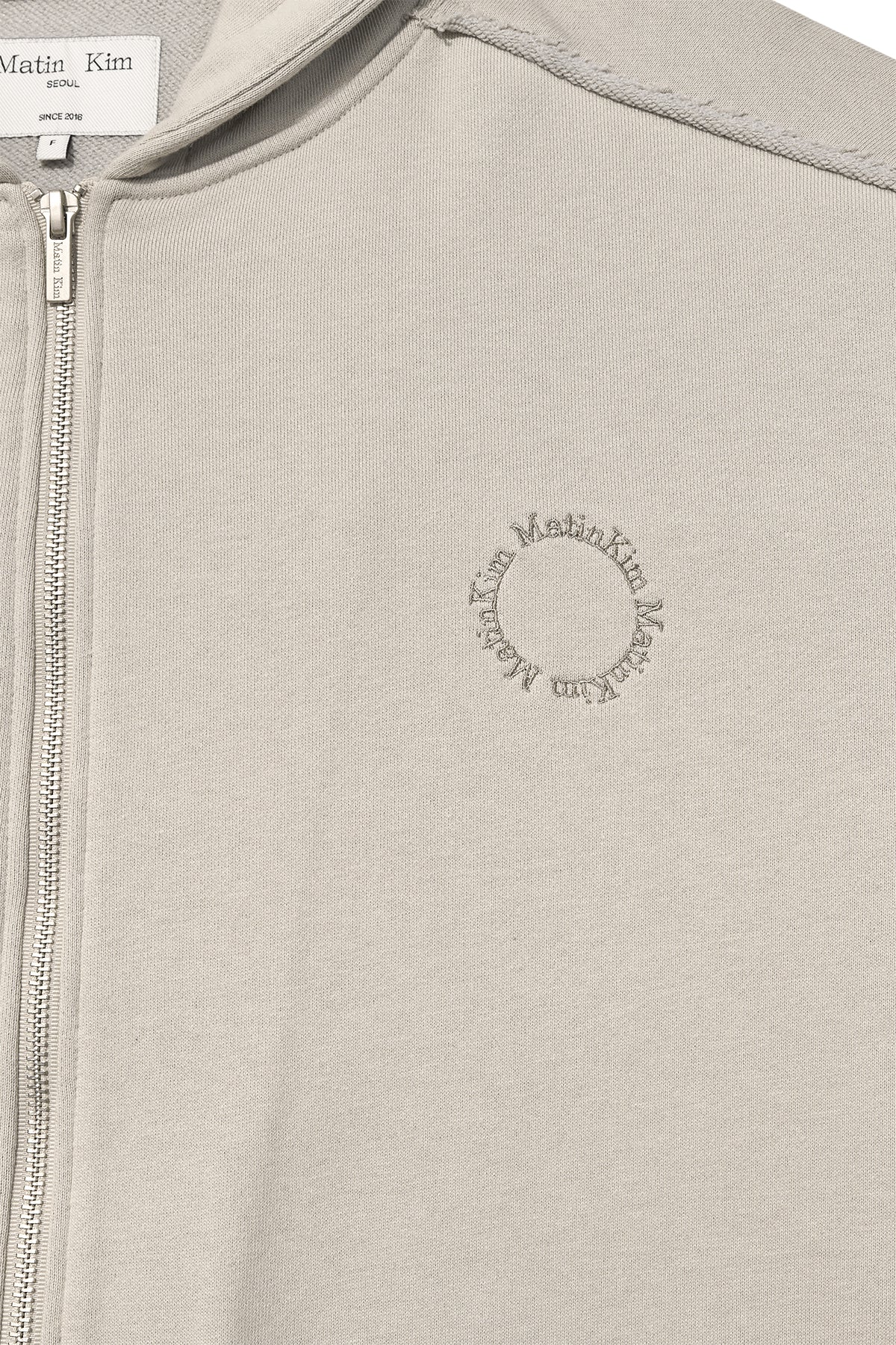 [matinkim] VOLUME POCKET HOODY ZIP UP IN PALE BEIGE