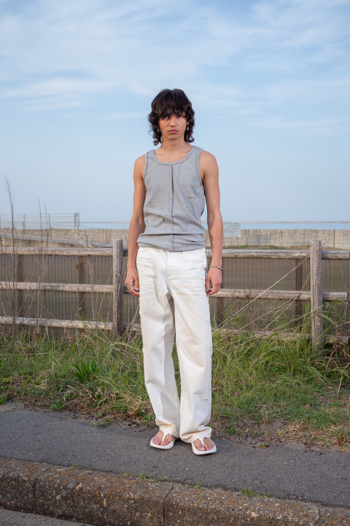 [matinkim] EMBO WASHED DENIM PANTS FOR MEN IN IVORY