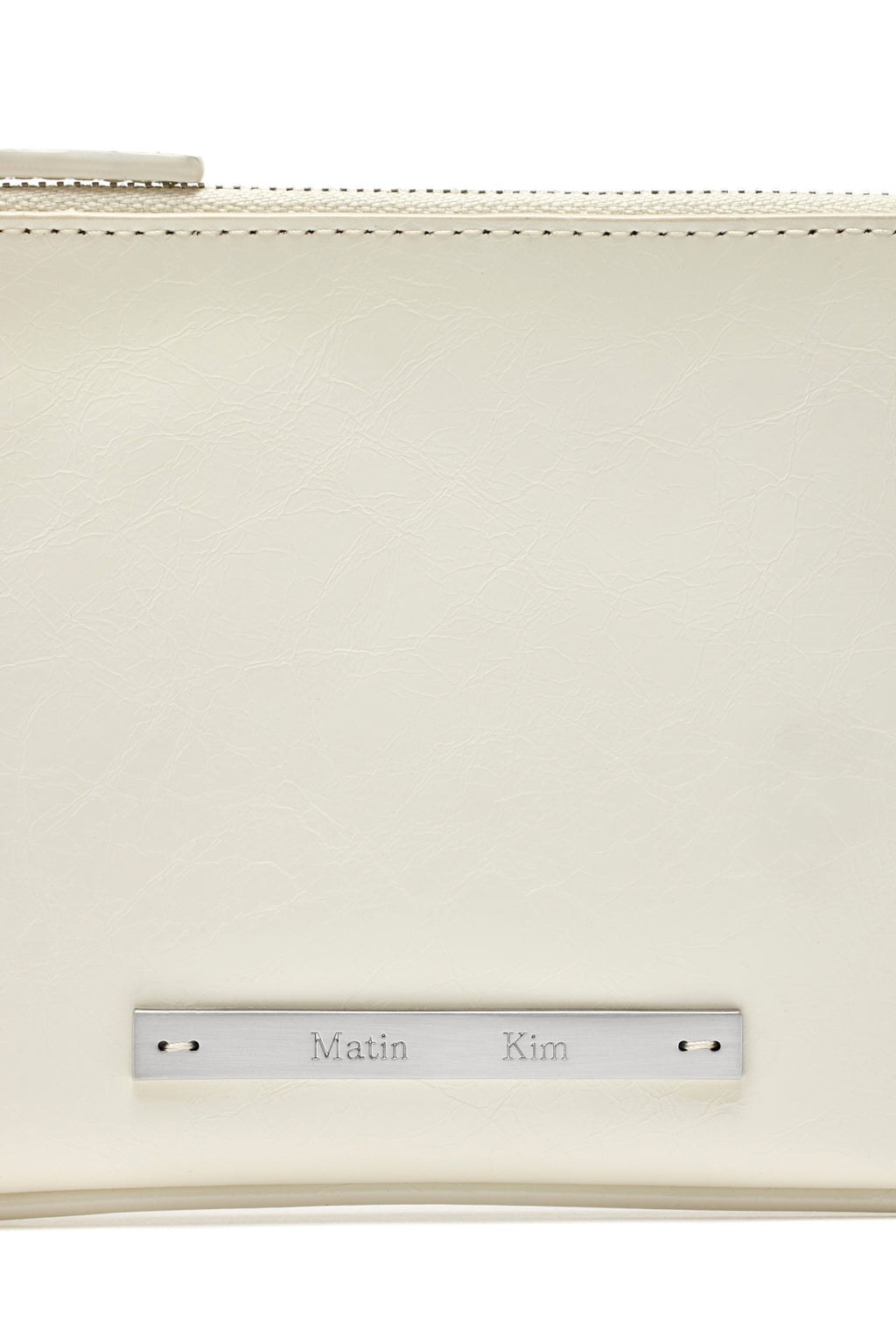 [matinkim] GLOSSY LEATHER MICRO BAG IN IVORY