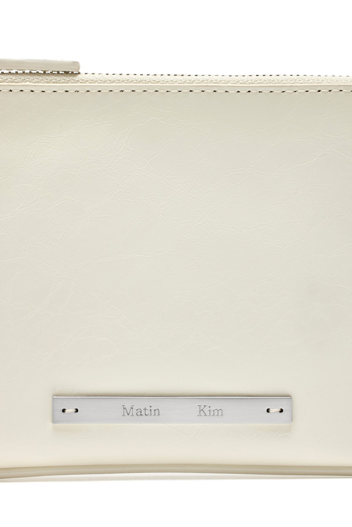 [matinkim] GLOSSY LEATHER MICRO BAG IN IVORY