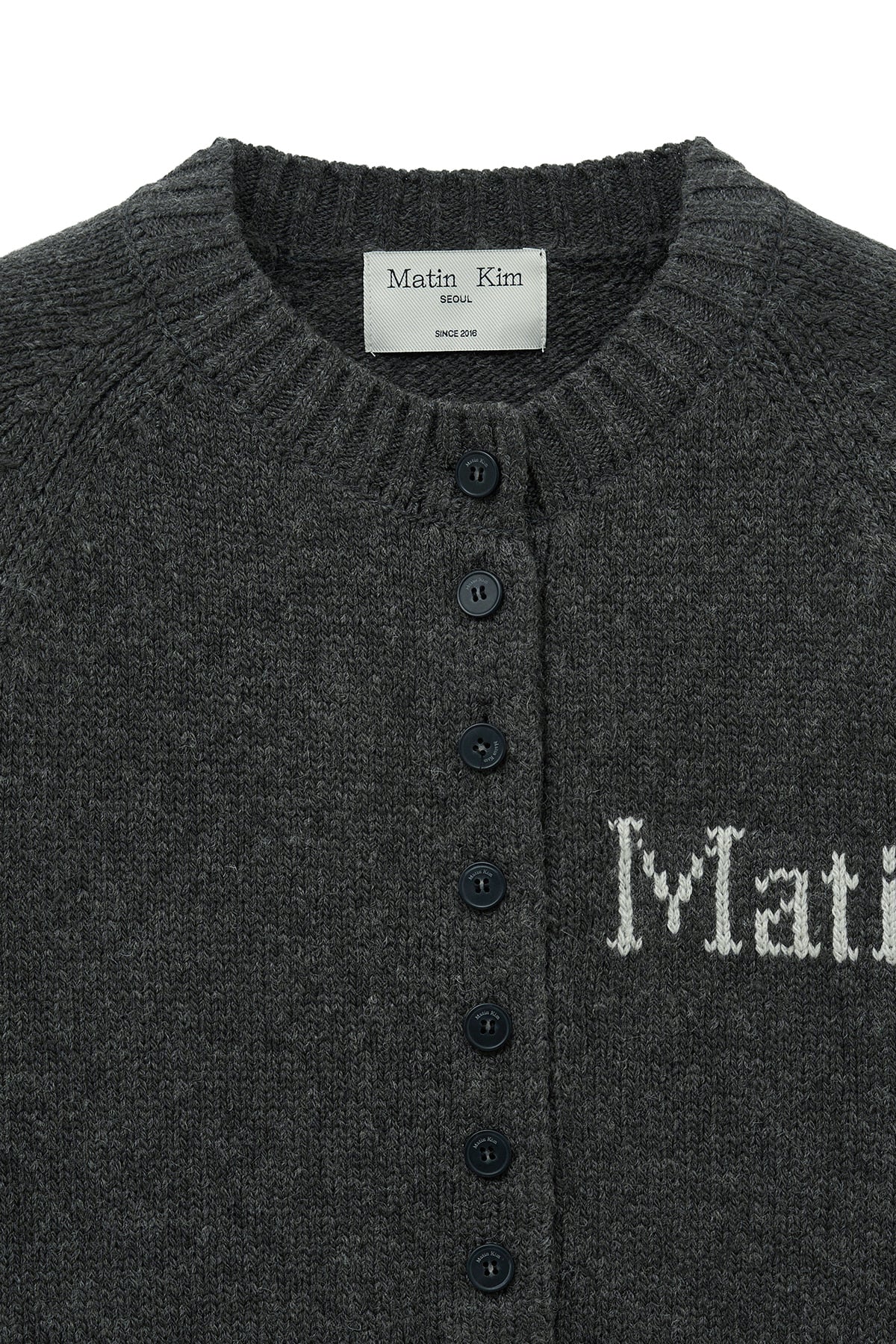 [matinkim] BUTTON POINT HENLY NECK LOGO KNIT TOP IN CHARCOAL