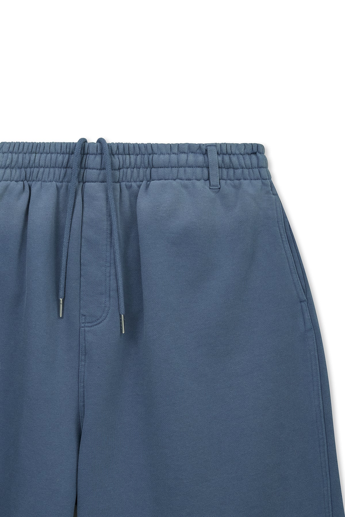 [matinkim] VINTAGE WASHED BACK LOGO BERMUDA SWEATPANTS IN SMOKE BLUE