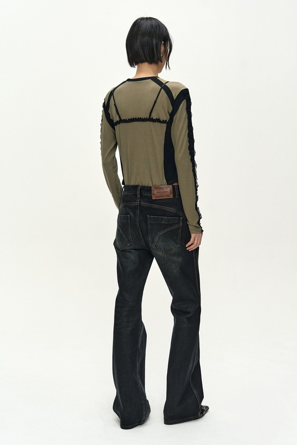Andersson Bell Twist Fold Coated Jeans