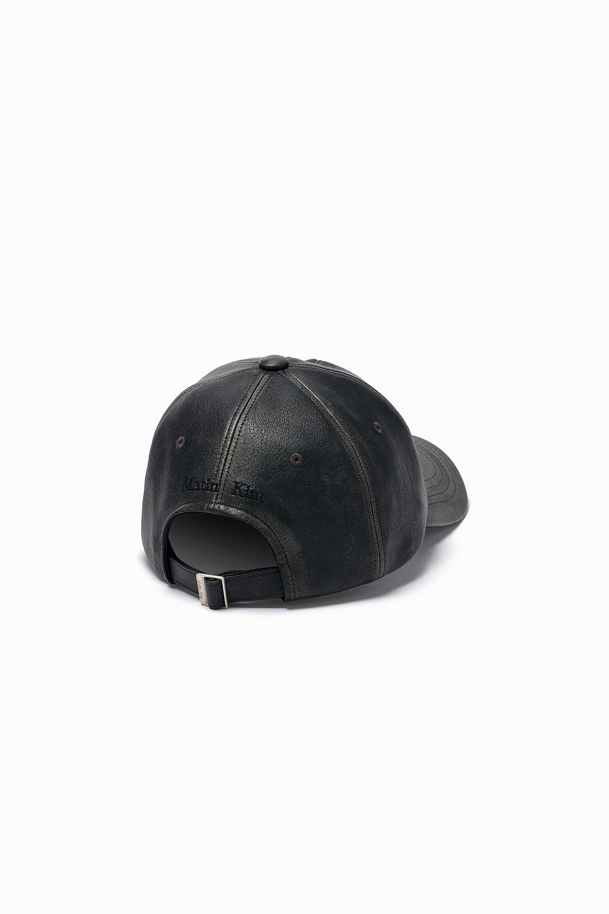 [matinkim] EMBOSSED LOGO LEATHER BALL CAP IN BLACK