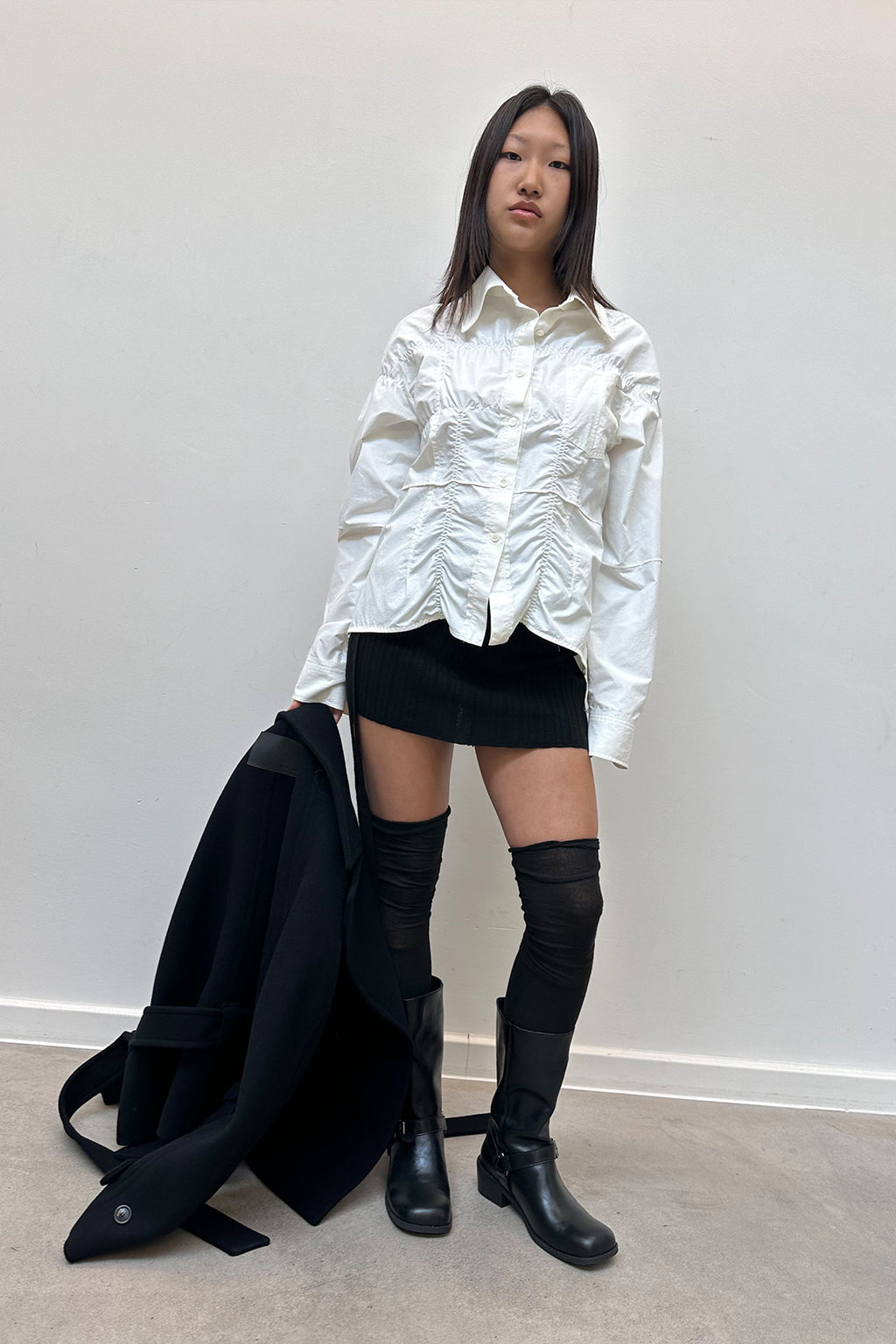 [matinkim] LAYERED KNIT STRING WRAP SKIRT IN BLACK